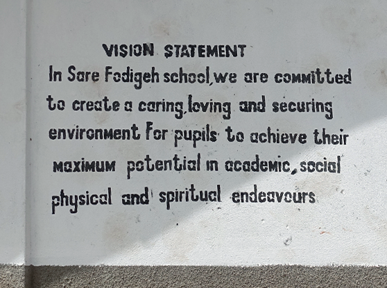 Text written on a school in The Gambia.
